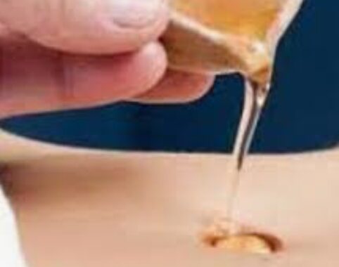 Oil massage in and around Navel